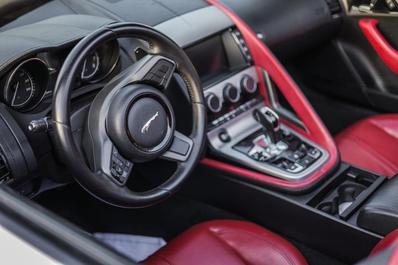 Luxury red interior of a taxi car