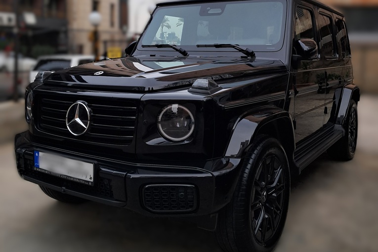 Black Mercedes G Class 2024 parked in Beirut parking angle of photo front right
